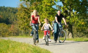 family riding bikes