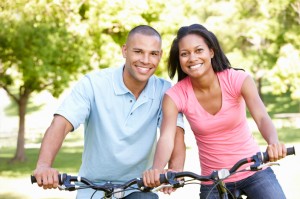 Young African American Couple Cycling