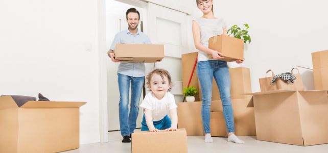 Young family with a child moves to a new home