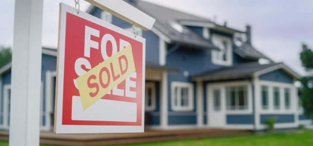 real estate home sold sign